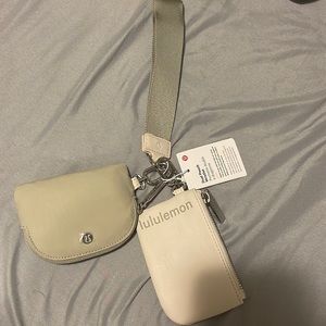 Dual pouch wristlet Lululemon. Brand new